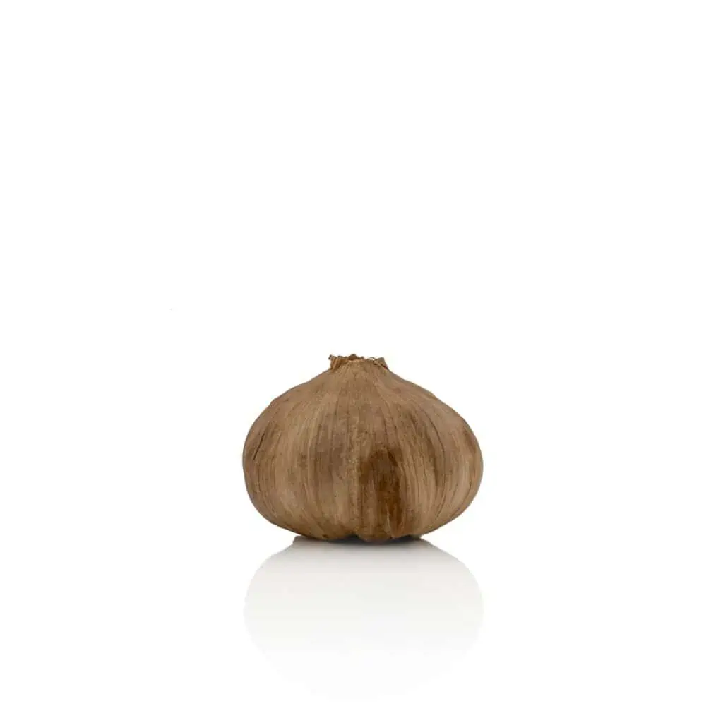 Single bulb of Black Garlic